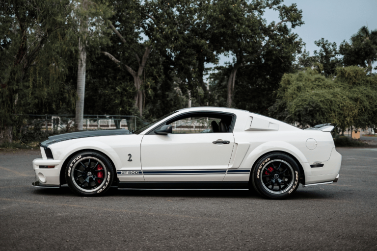 How to Fold Down the Rear Seats in a Ford Mustang - HiRide