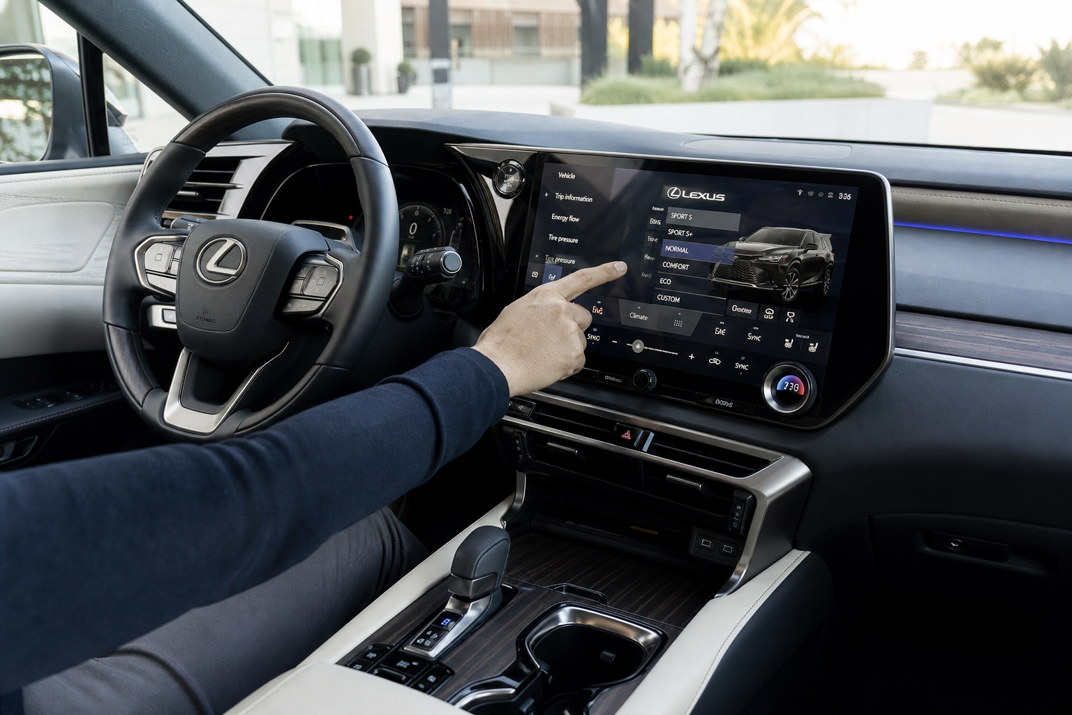 Driver navigating vehicle settings on a Lexus TX infotainment touchscreen to disable auto start-stop