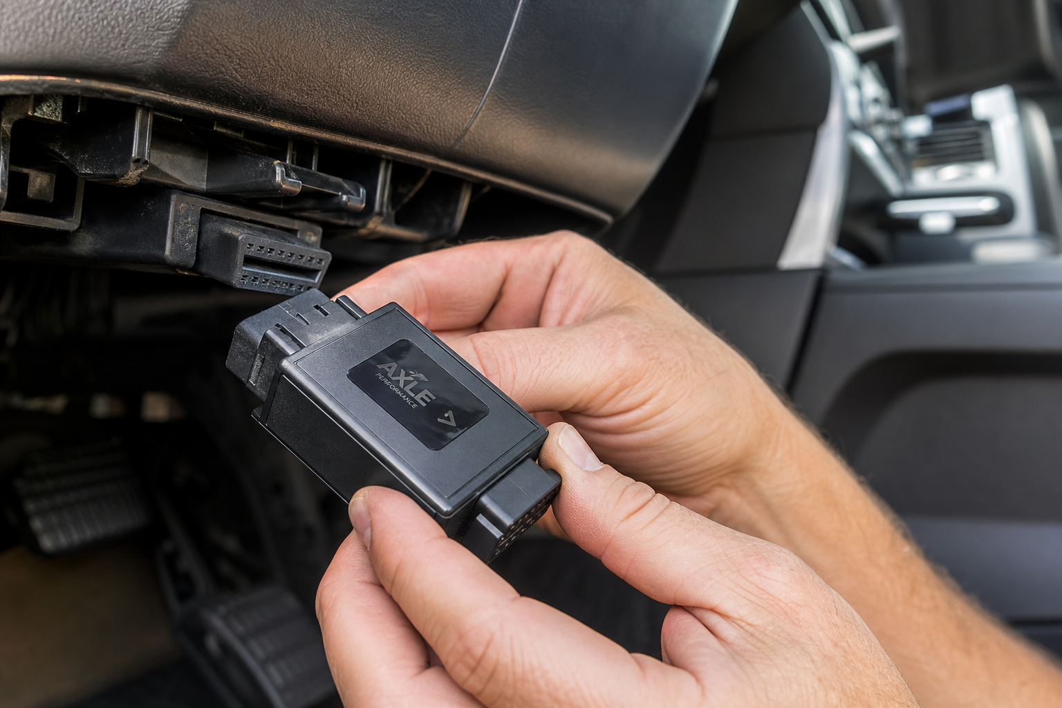 A plug-and-play auto start stop eliminator module being connected to a truck's wiring harness