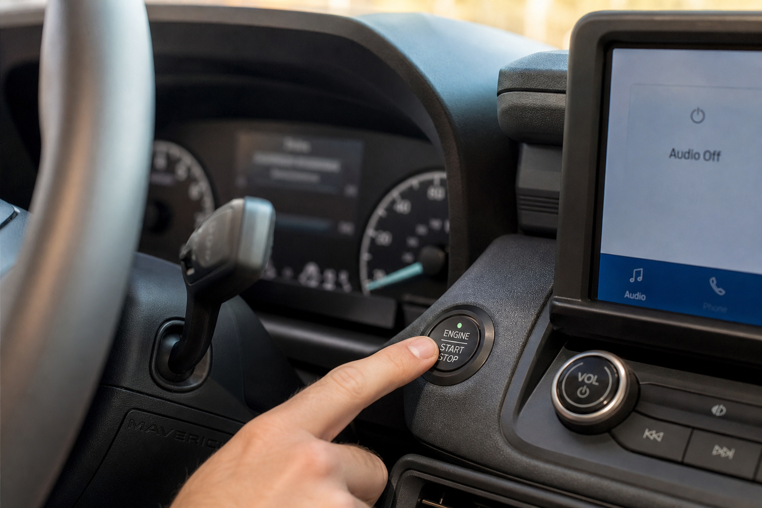 A finger pressing the Auto Start/Stop disable button on a Ford Maverick dashboard