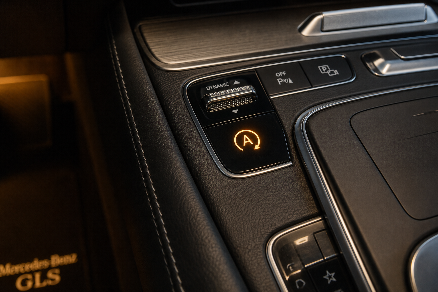 Close-up of the Auto Start/Stop button on a Mercedes-Benz GLS center console
