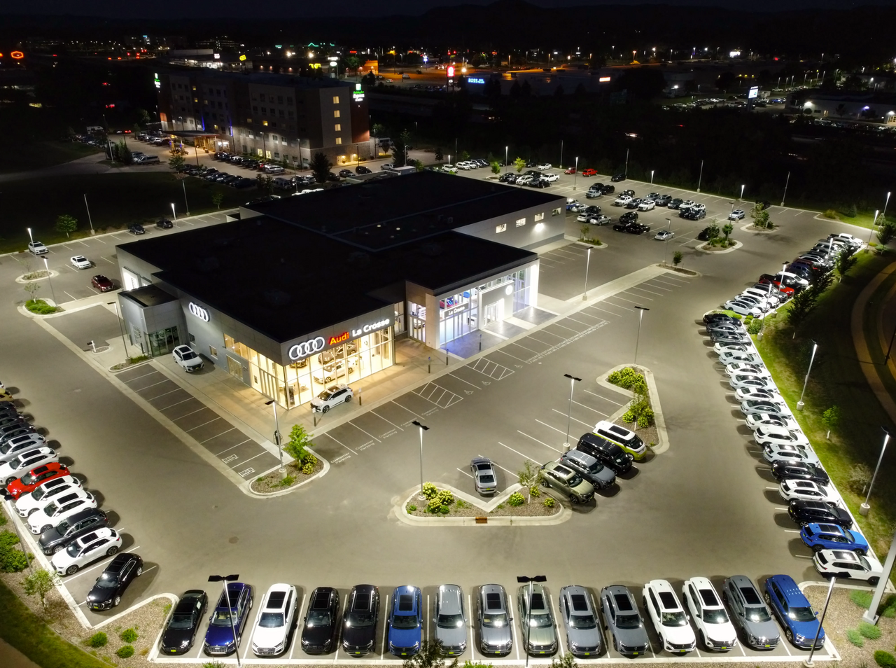 Cars parked at an automotive dealership