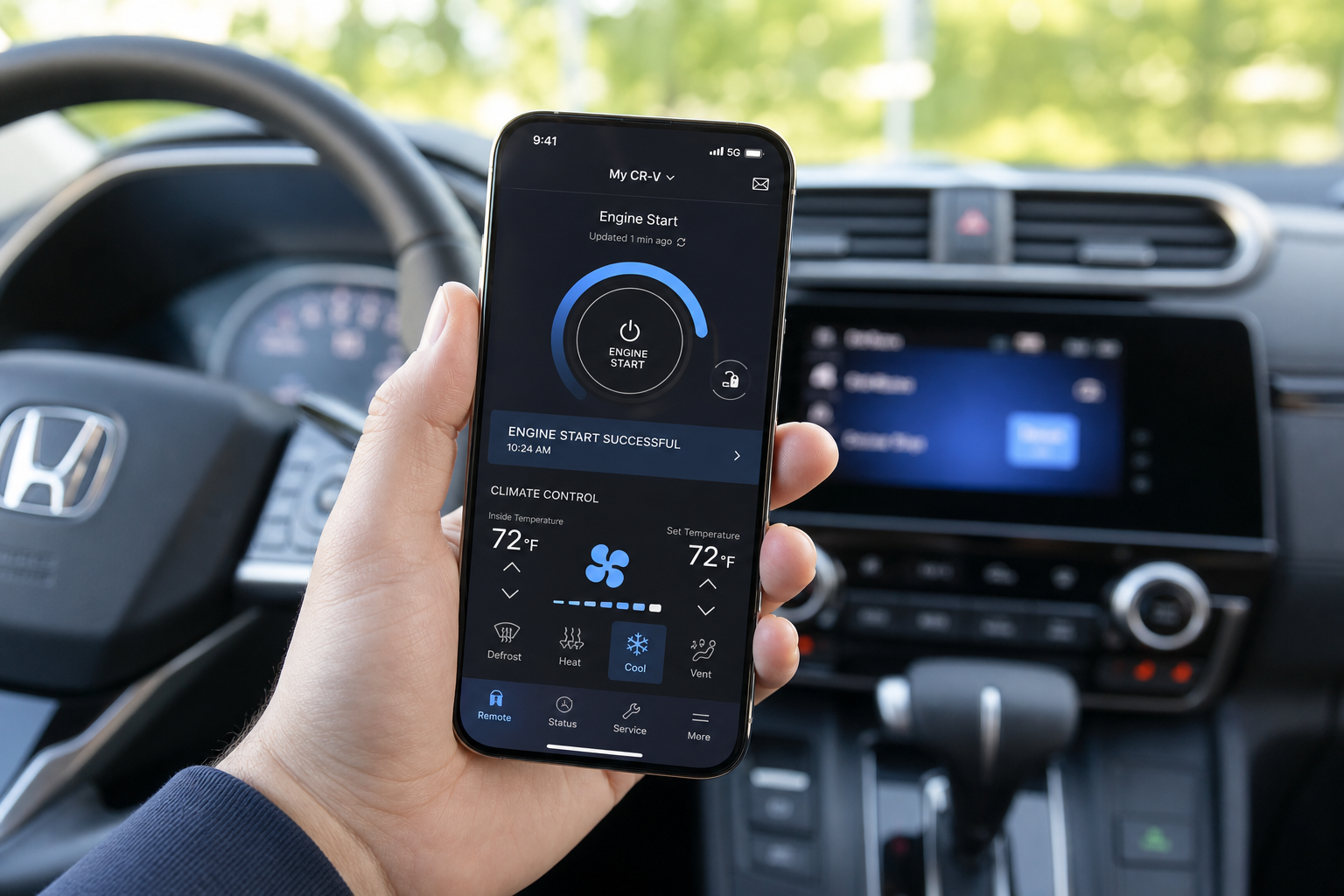 Smartphone displaying a remote start climate control app inside a Honda CR-V