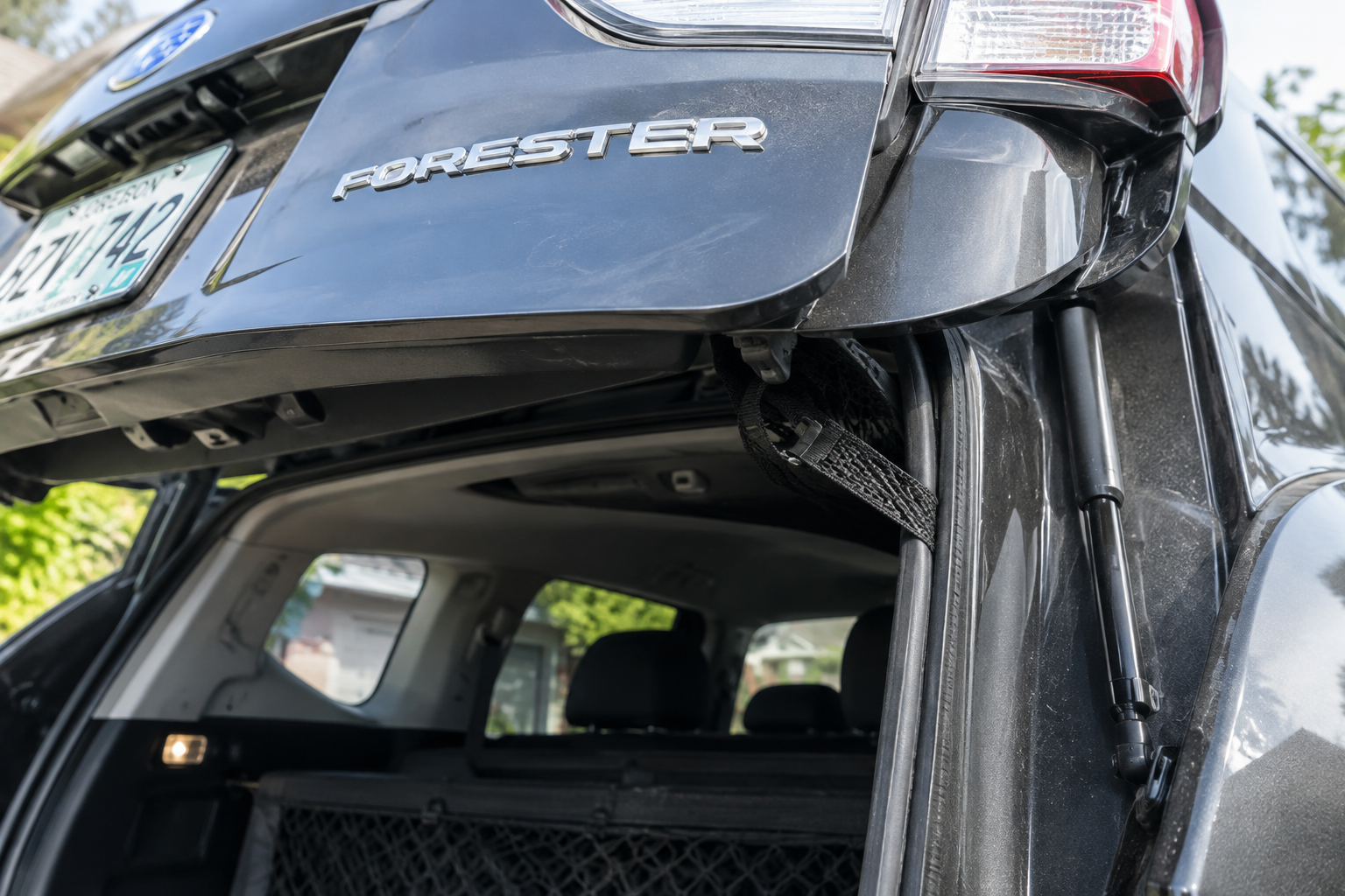 Object caught in Subaru Forester liftgate edge causing obstruction sensor to trigger