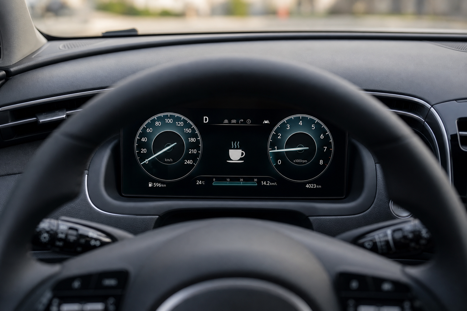 Hyundai Tucson dashboard showing a driver attention warning icon on the instrument cluster