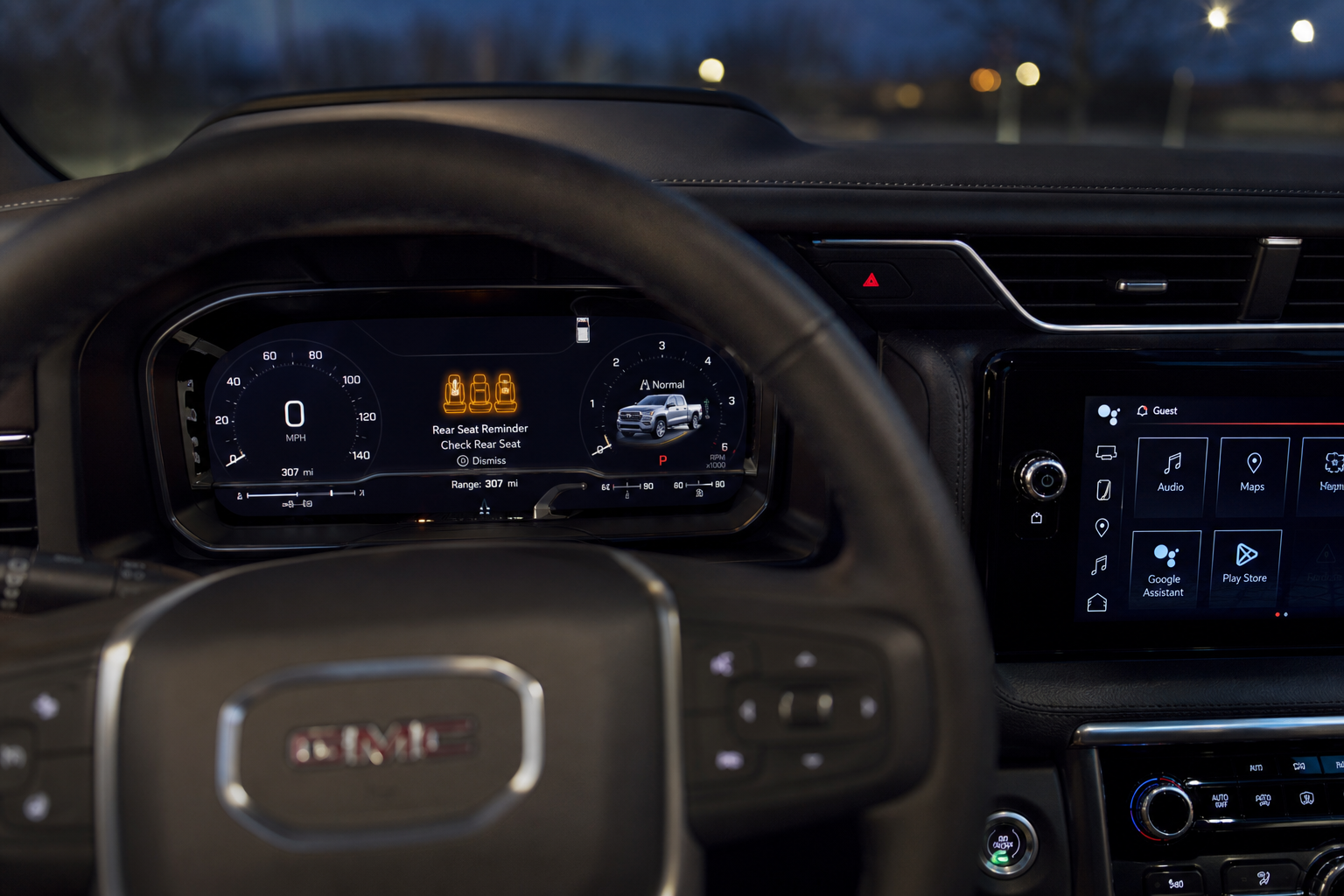 GMC Yukon dashboard showing rear seat reminder alert icon on instrument cluster