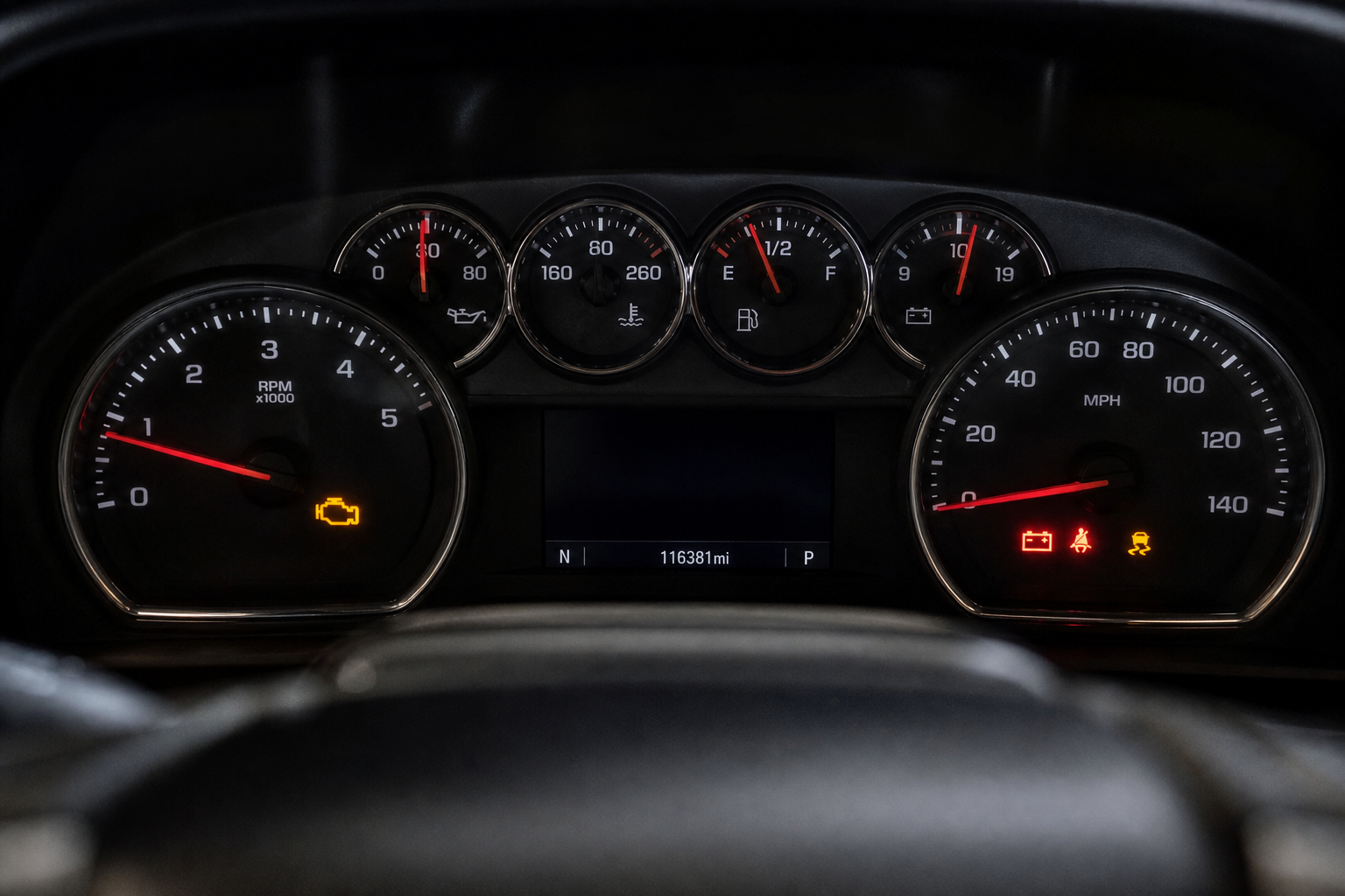 Chevy Tahoe dashboard showing illuminated warning lights and dashboard icons