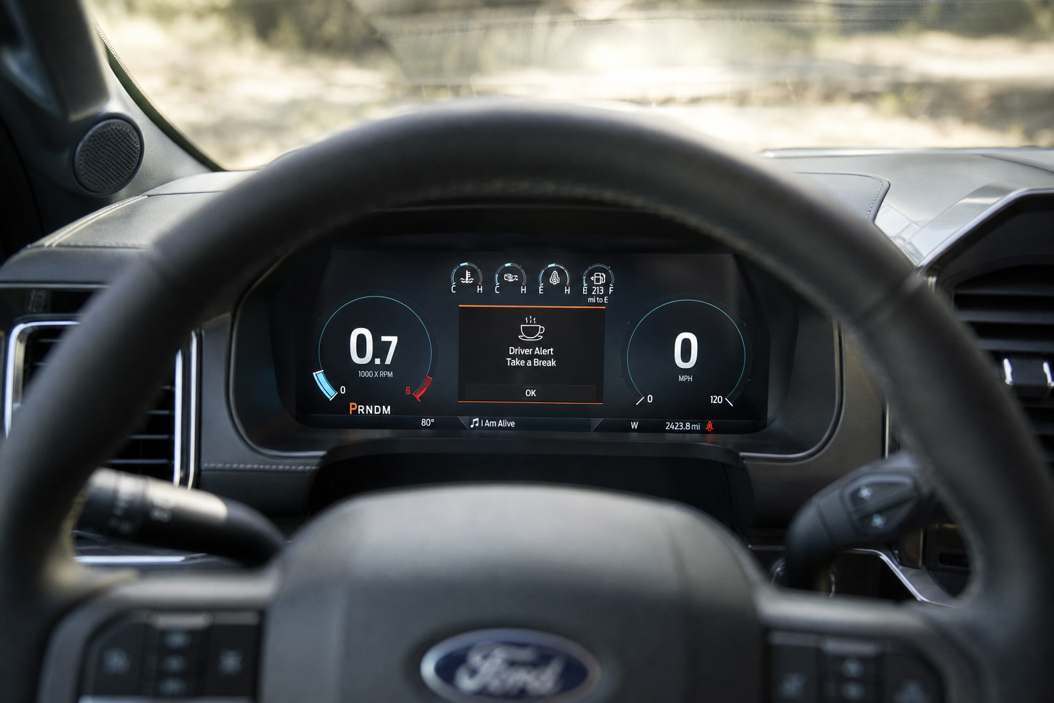 Ford F-150 dashboard showing driver alert warning icon on instrument cluster