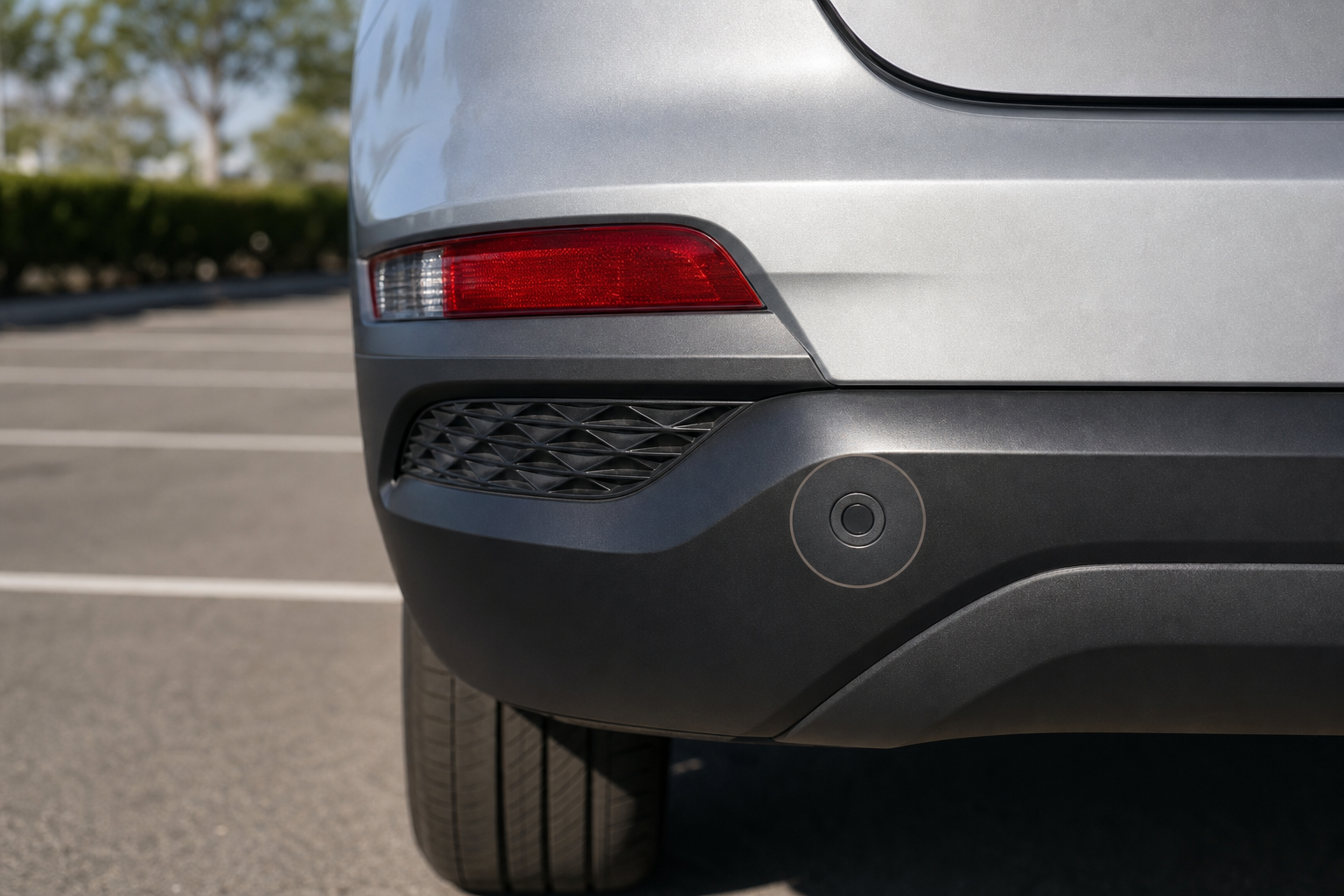 Close-up of Hyundai Tucson rear bumper showing blind spot sensor location