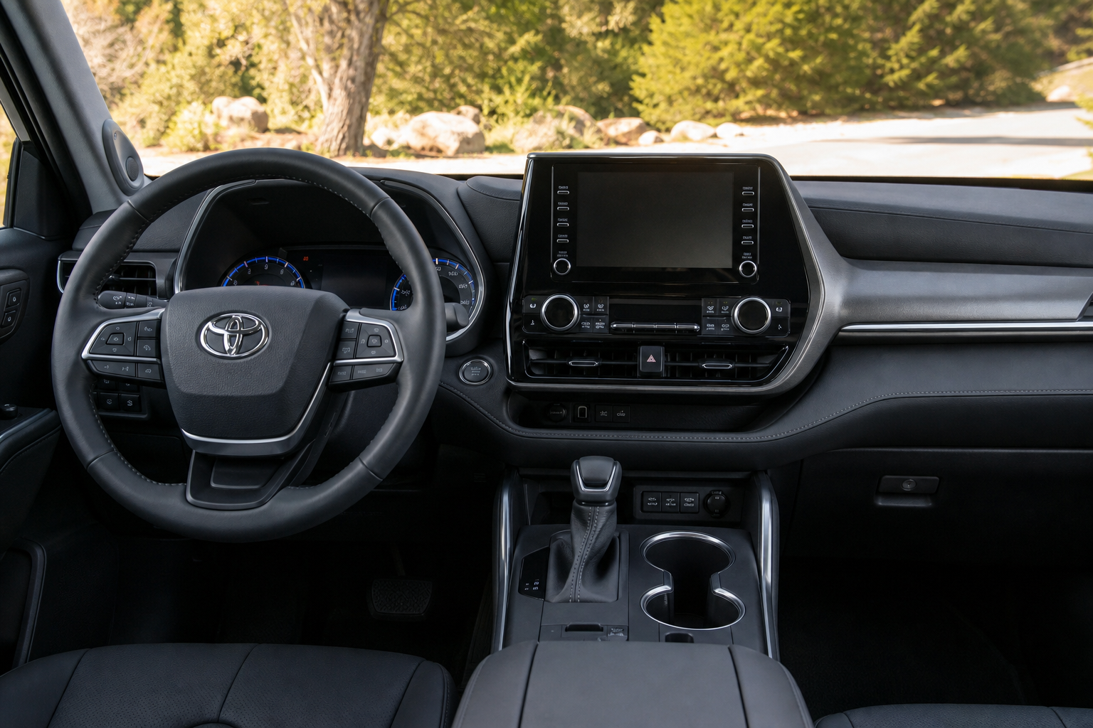Interior view of a modern Toyota Highlander dashboard and touchscreen